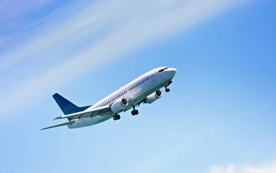 airplane flying blue sky travel 260nw 2450797723 copy